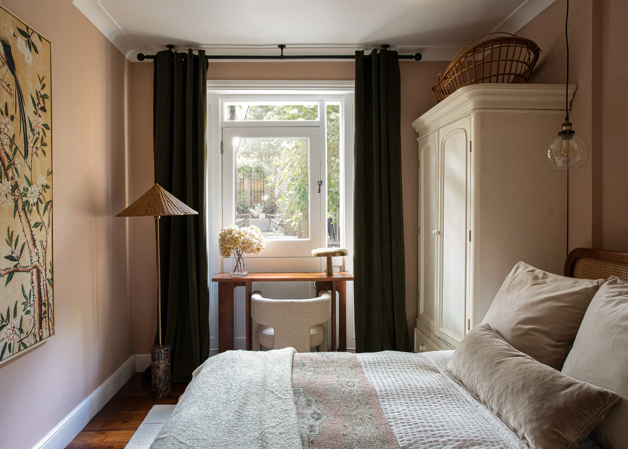 Bedroom with green velvet bed